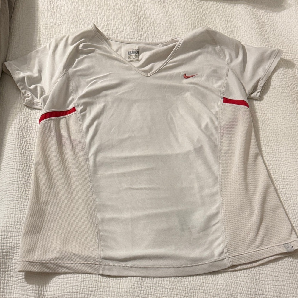 white Nike Dri-FIT V-neck tennis t-shirt with red accents